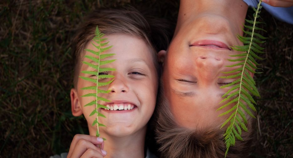 close-up-portrait-of-two-happy-smiling-brothers-ly-2026-03-16-02-10-30-utc